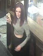 Police are looking for this woman, accused of throwing hot liquid at a woman at a burger bar in Queenstown.