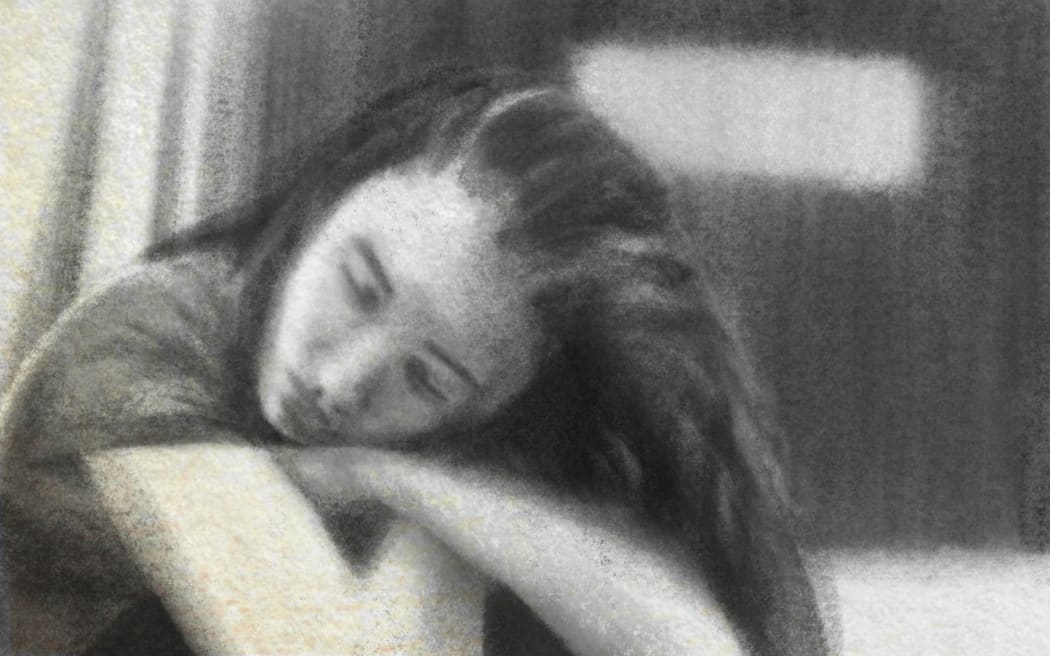 Charcoal sketch of young person in secure room care