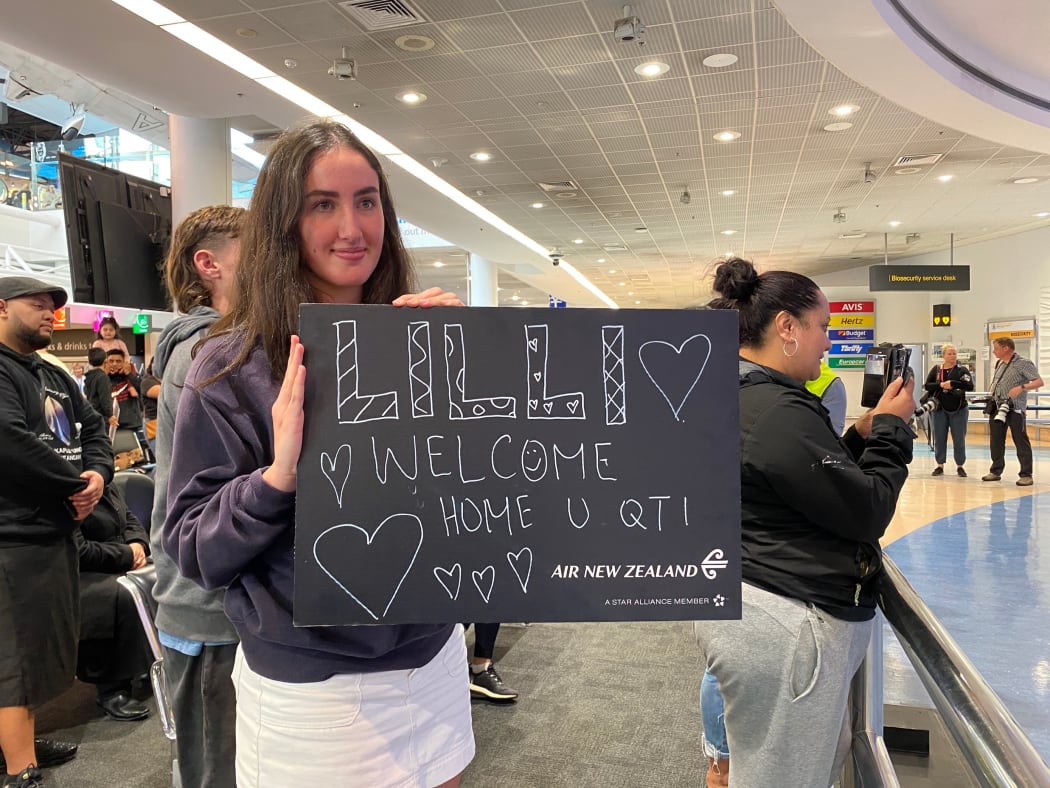 Lily awaiting her best friend Lilli. She says the two of them cried on the phone when she booked her flight.