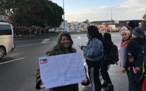 About 80 people protested outside Fletcher Building's Auckland headquarters this morning against the company's proposed development at Ihumātao.