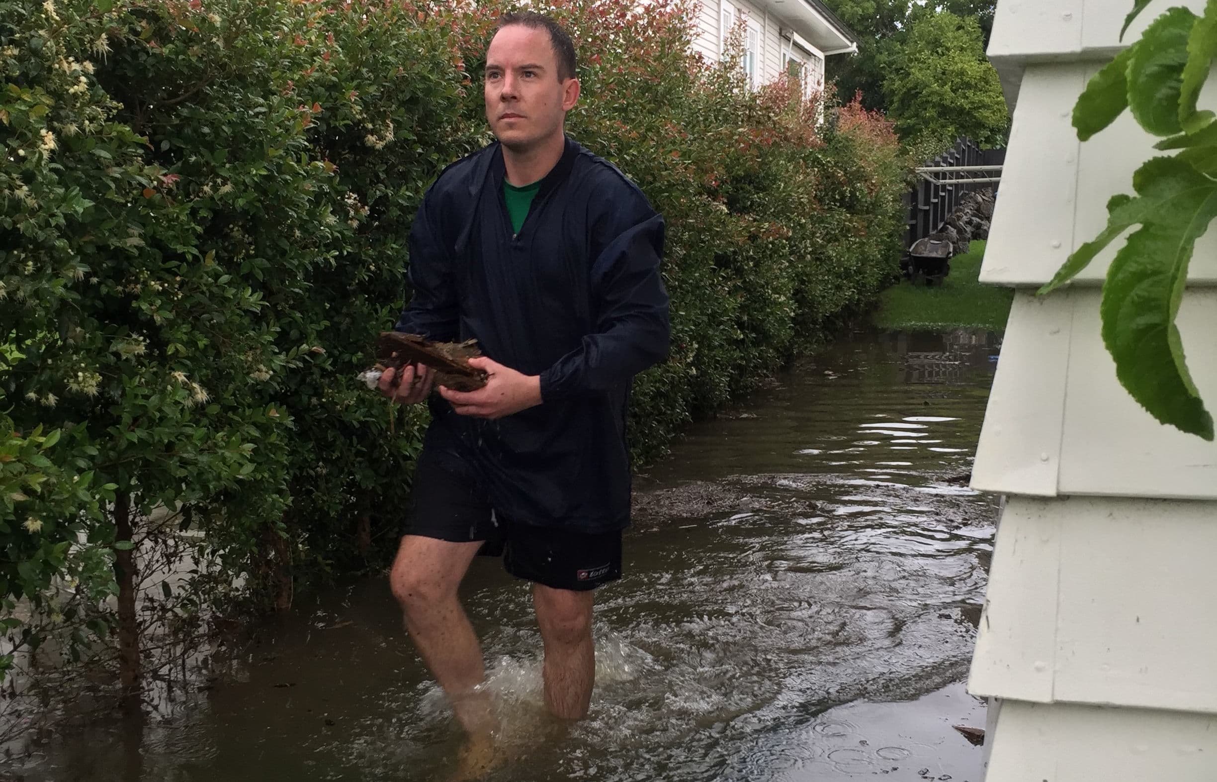 Brennan Fell outside his flooded Mt Albert house.