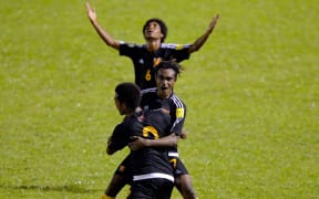 PNG celebrate their win over Tahiti.