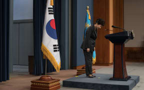 South Korea's President Park Geun-Hye bows prior to delivering an address to the nation at the presidential Blue House in Seoul after the impeachment was upheld.