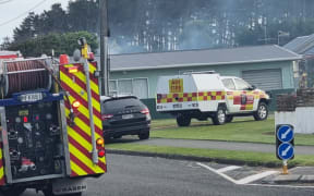 Fire crews have been battling a house fire in Foxton Beach .