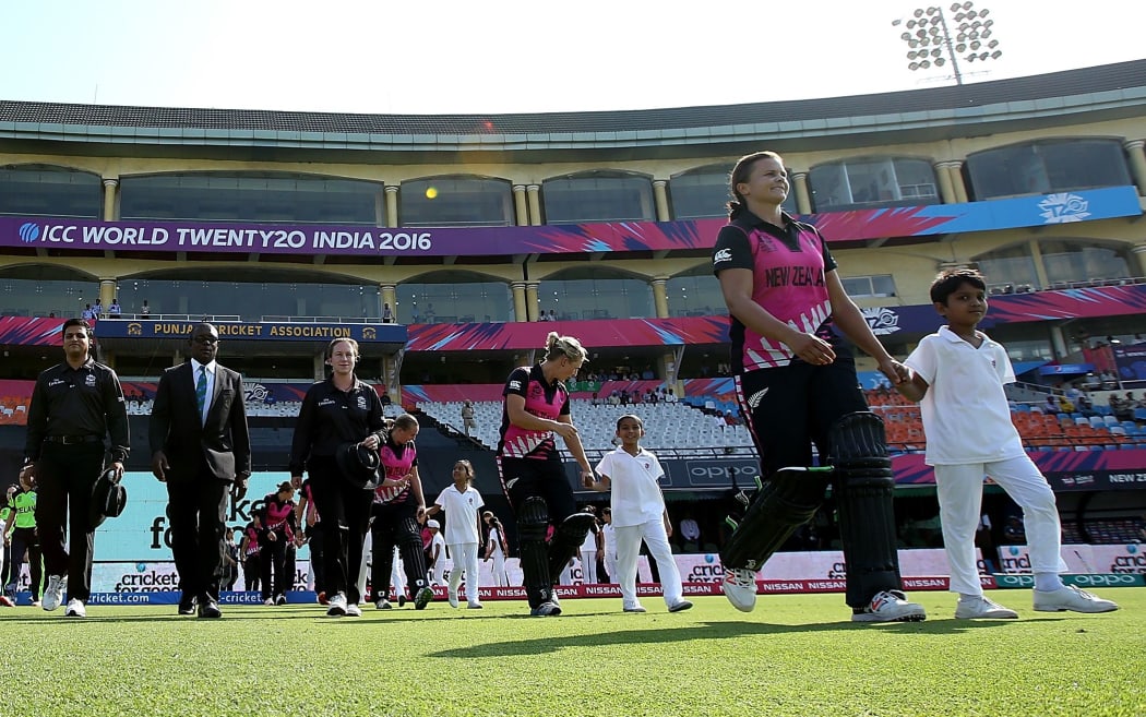White Ferns captain Susie Bates leads her side out against Ireland.