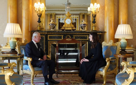King Charles III meets with New Zealand Prime Minister Jacinda Ardern, during a meeting of Prime Ministers of the Realms, in the 1844 Room in Buckingham Palace in London on September 17, 2022. - Queen Elizabeth's state funeral will take place on September 19, in London's Westminster Abbey, with more than 2,000 guests invited, including heads of state and government from around the world. (Photo by Stefan Rousseau / POOL / AFP)