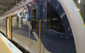 An Auckland Transport-branded train at Britomart/Waitematā Station.
