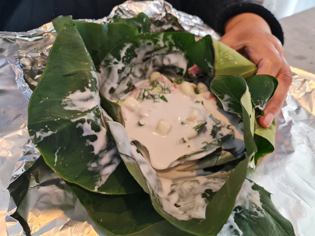 Lu involves taro leave, onions, meat and coconut cream