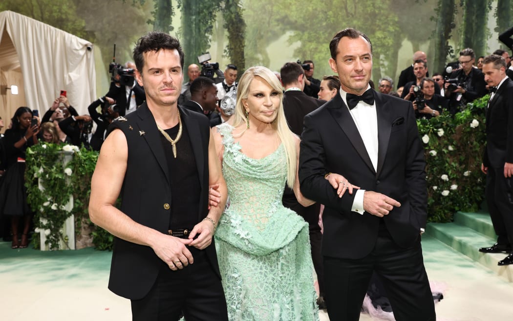 NEW YORK, NEW YORK - MAY 06: (L-R) Andrew Scott, Donatella Versace and Jude Law attend The 2024 Met Gala Celebrating "Sleeping Beauties: Reawakening Fashion" at The Metropolitan Museum of Art on May 06, 2024 in New York City. (Photo by Jamie McCarthy/Getty Images)