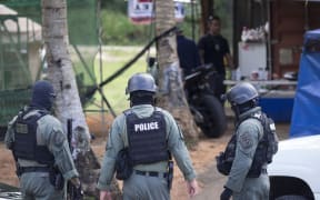 Guam SWAT officers execute a search warrant at a property on Chalan Dogga in Dededo on the 15th of July 2017.
