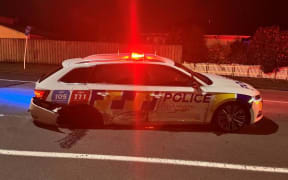 Police car damaged in crash involving suspected drunk driver.