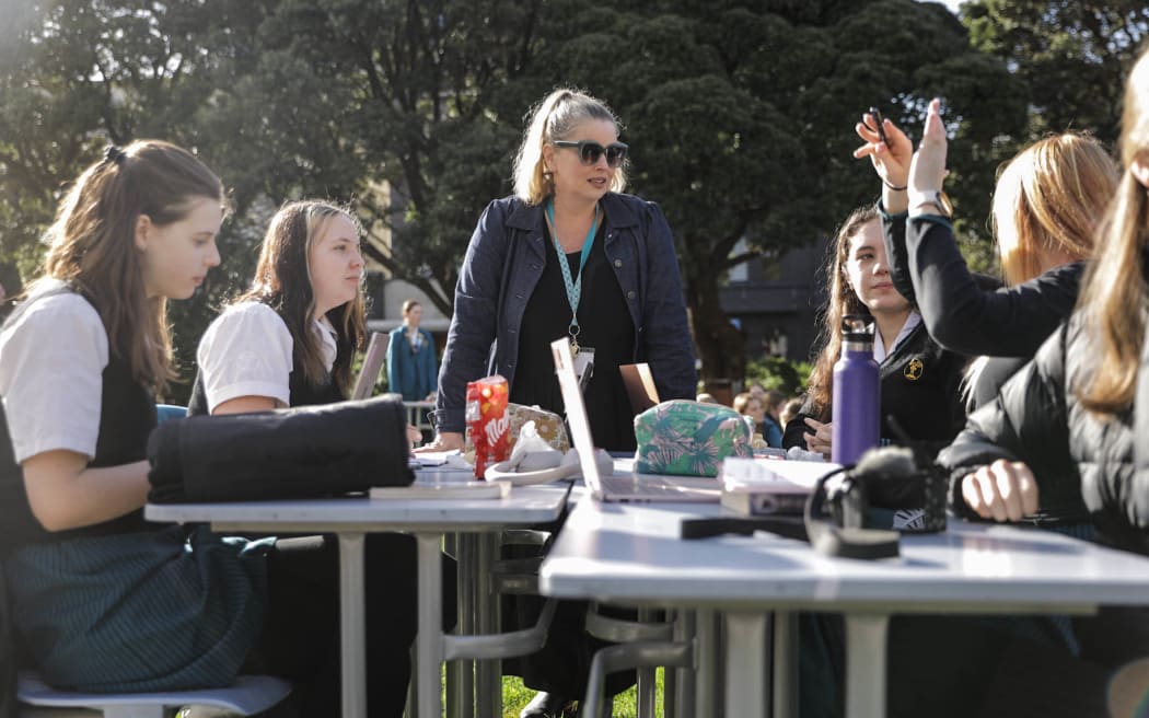 About 60 Wellington Girls' College students set up a makeshift classroom on Parliament grounds as a protest against the school having to close for two days over quake-prone buildings.