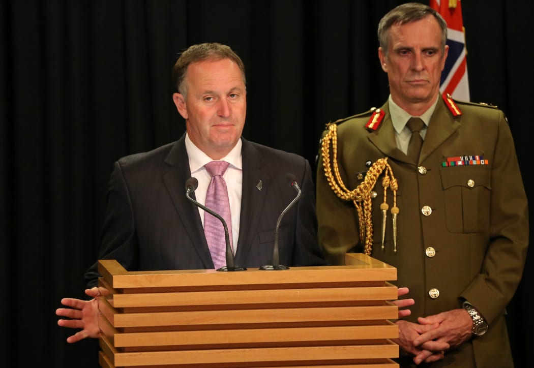 Prime Minister John Key (left) and Chief of Defence Force Tim Keating (right).