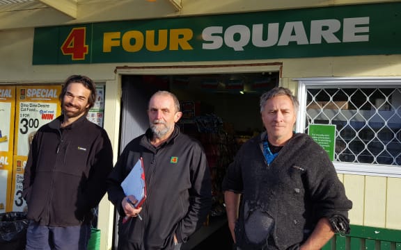 Waimamaku locals outside the Four Square.