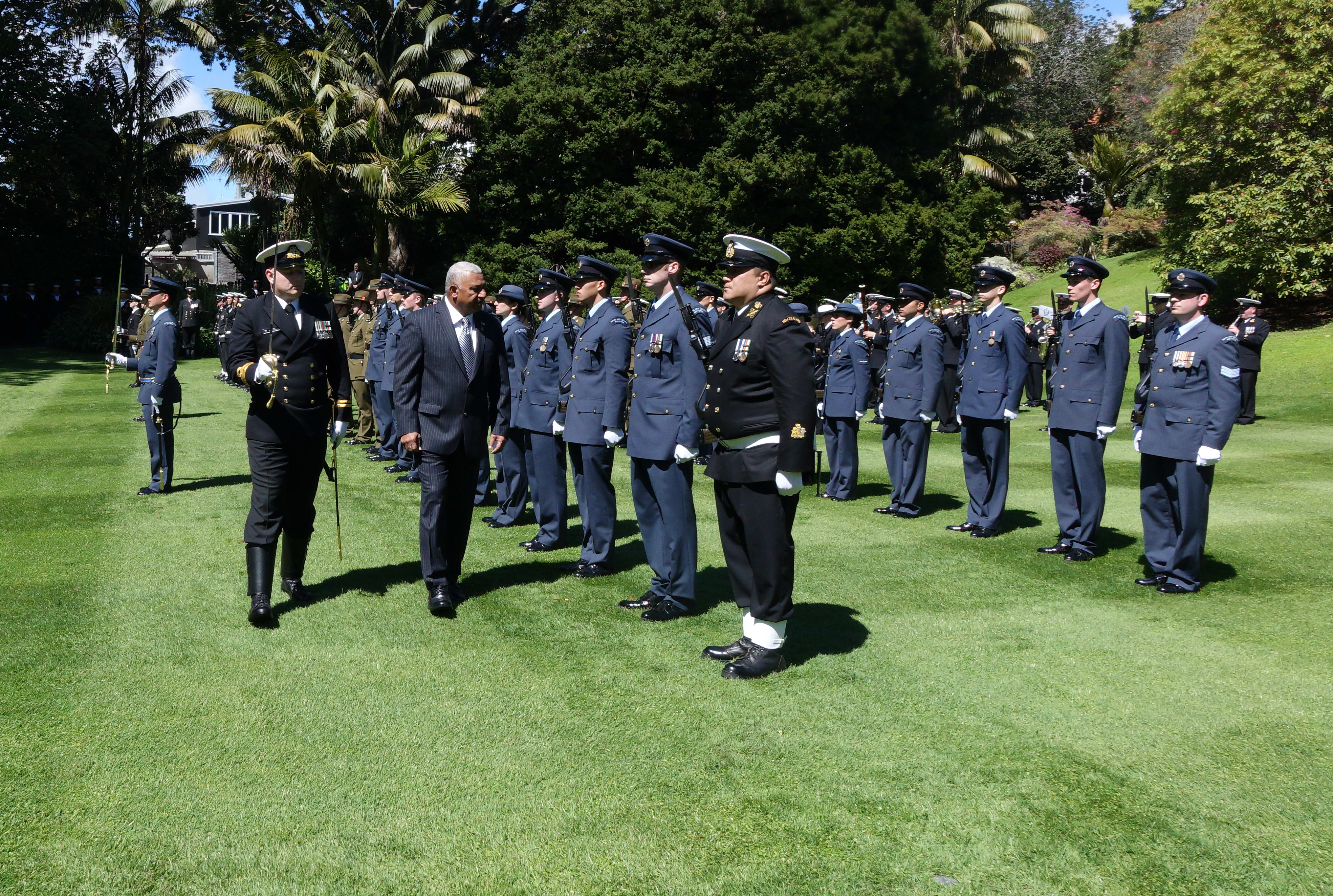 Fijian Prime Minister Frank Bainimarama inspects the troops at Government House in Auckland during his first formal welcome in 10 years