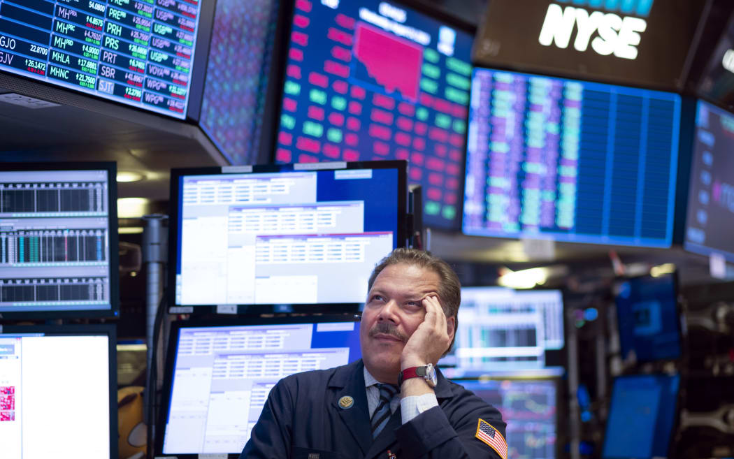 Traders work before the closing bell at the New York Stock Exchange (NYSE) on August 14, 2019 in New York City.