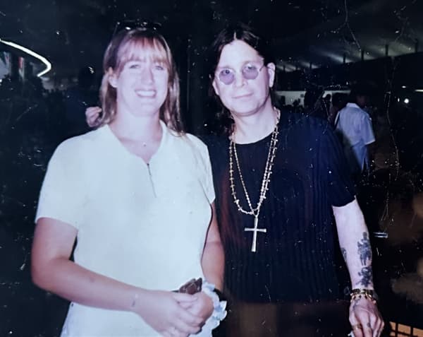 New Zealand fan Sarah Lillas with Ozzy Osbourne at Auckland Airport following Ozzy’s show at Logan Campbell Centre in In 1998.
