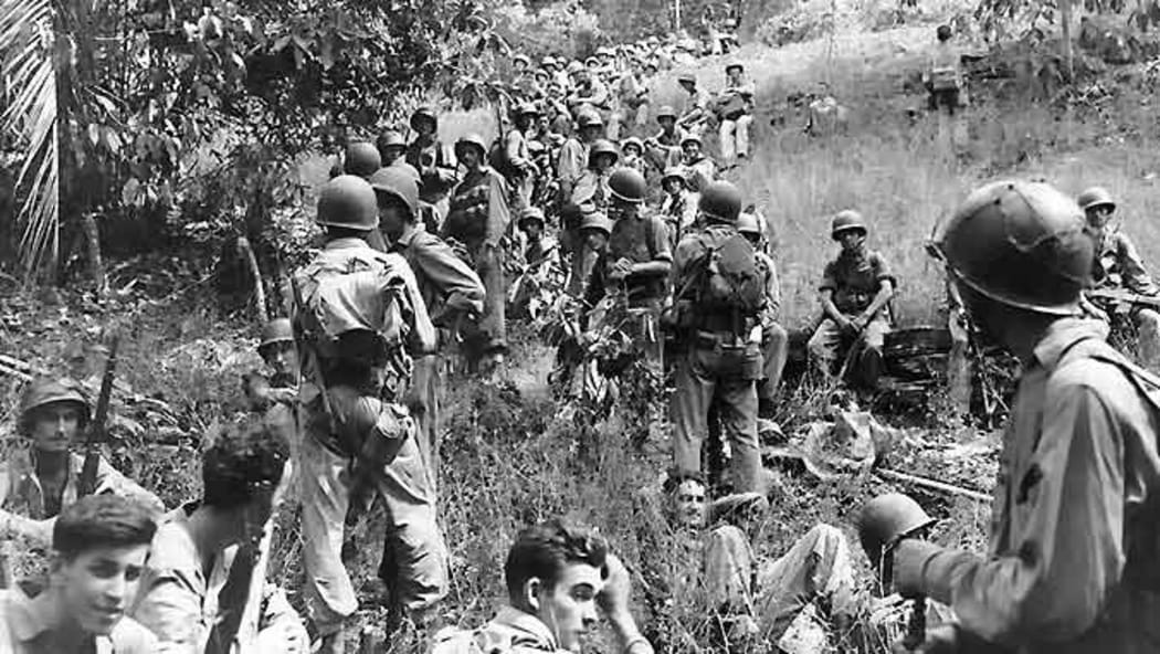Marines rest in the field on Guadalcanal.
