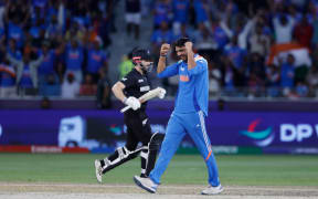 Axar Patel of India celebrates the wicket of Kane Williamson of New Zealand during their Champions Trophy pool game.
