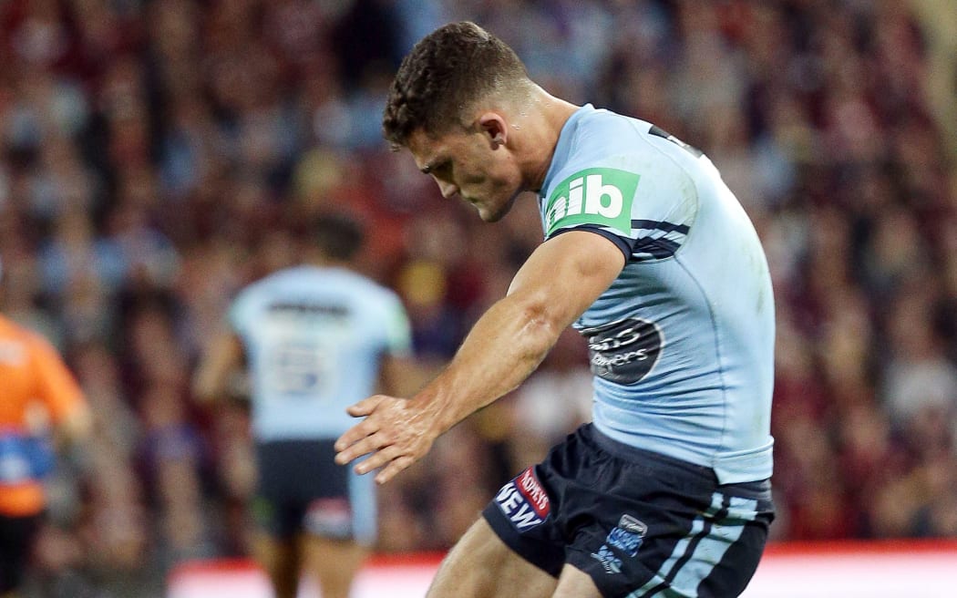 athan Cleary of New South Wales kicks for goal during the Queensland Maroons v NSW Blues State Of Origin Game 1 at Suncorp Stadium, Brisbane, Australia. 5 June 2019. Photo credit: Tertius Pickard / www.photosport.nz