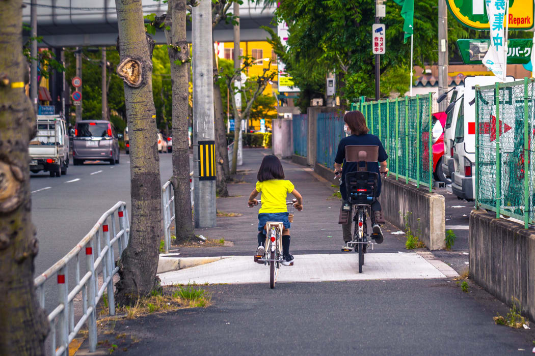 More people in Japanese cities such as Osaka have bicycles than cars, and the infrastructure is designed for crowds of commuters on bikes.