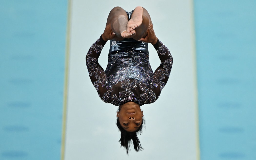 Simone BILES of United States performs during Vault of artistic gymnastics women’s qualification at Bercy Arena in Paris, France on July 28, 2024.( The Yomiuri Shimbun ) (Photo by Kaname Muto / Yomiuri / The Yomiuri Shimbun via AFP)