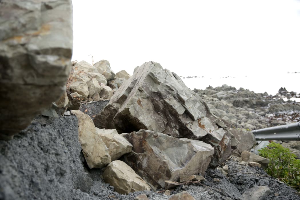 Boulders cover state highway 1