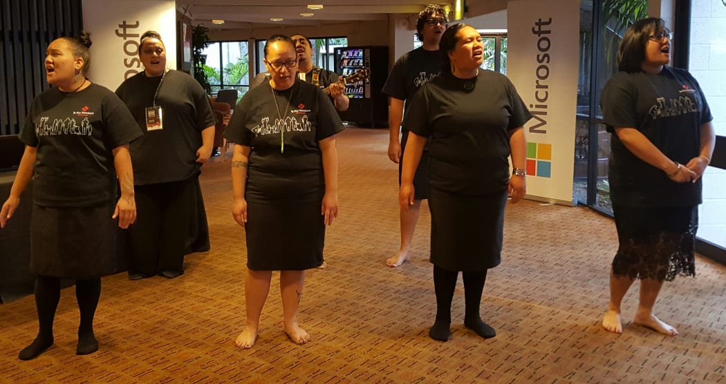 A kapahaka group welcome Whānau Ora manuwhiri at Te Pou Matakana conference.