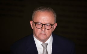 Australia's Prime Minister Anthony Albanese reacts as he listens to questions during a press conference at the Sydney Jewish Museum in Sydney on 11 December, 2024. - Albanese in a statement on social media said "I stand with the Jewish community and unequivocally condemn this attack", after vandals daubed anti-Israel graffiti in a Sydney suburb on December 11, days after a Melbourne synagogue was set ablaze.
