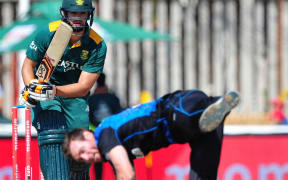 Rilee Rossouw of South Africa plays an attacking shot past Doug Bracewell of New Zealand during the One Day International Series match between South Africa and New Zealand at Senwes Park in Potchefstroom.