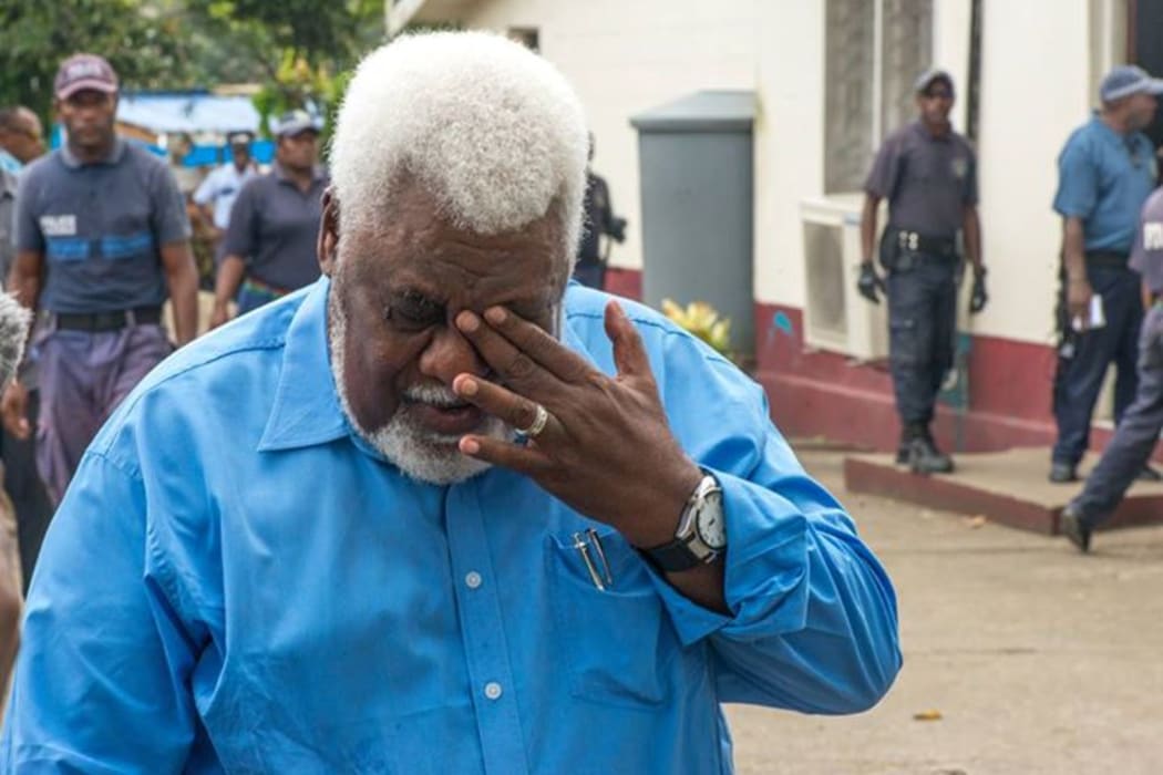 Willie Jimmy wipes away a tear as he exits, head bowed, from the Supreme Court. Alone of the 15 MPs facing sentencing, Mr Jimmy's sentence of 20 months was suspended for two years.