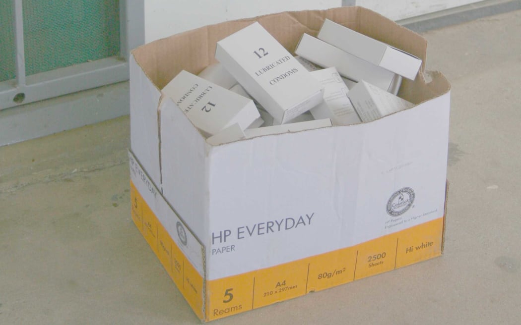 Box of condoms laying idle at Port Moresby General Hospital, Papua New Guinea.