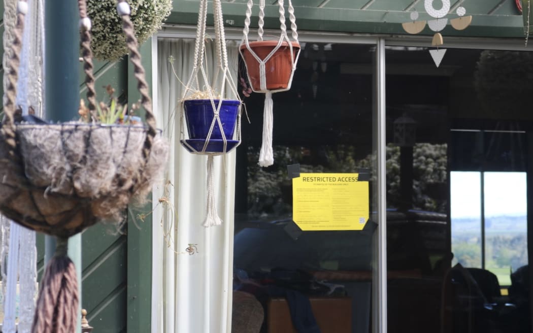 The yellow sticker on Robyn Hale's home, after severe spring storms, in October, 2025.