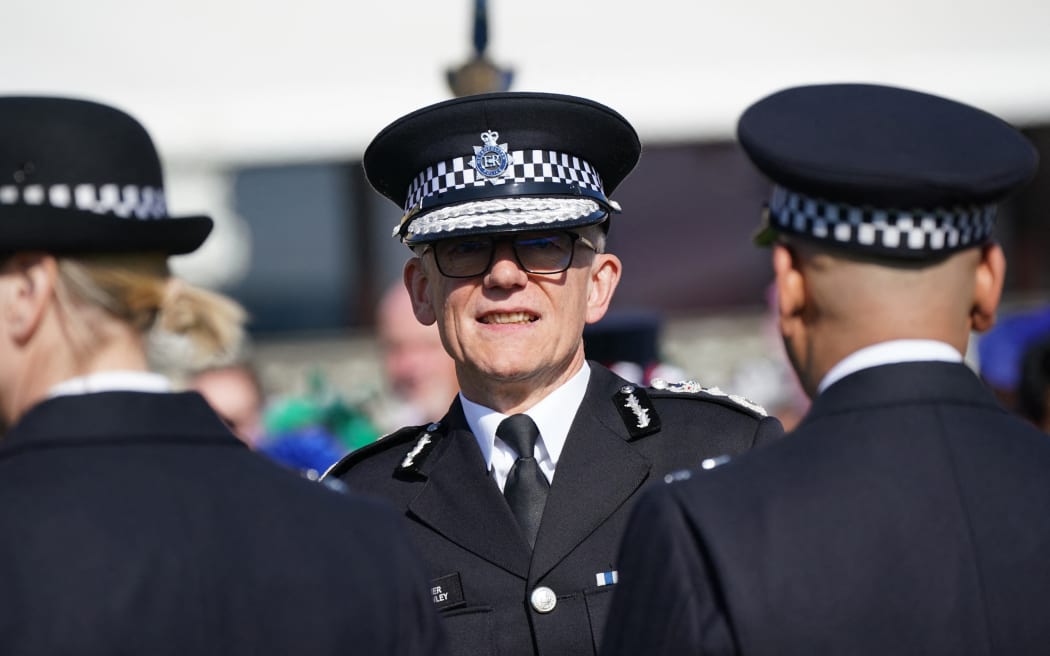 Metropolitan Police Commissioner Sir Mark Rowley  attends the Garden Party at Buckingham Palace, in London, on May 3, 2023 to celebrate Britain's King Charles III and his wife Britain's Camilla, Queen Consort coronation ceremony as King and Queen of the United Kingdom and Commonwealth Realm nations, on May 6, 2023. (Photo by Yui Mok / POOL / AFP)