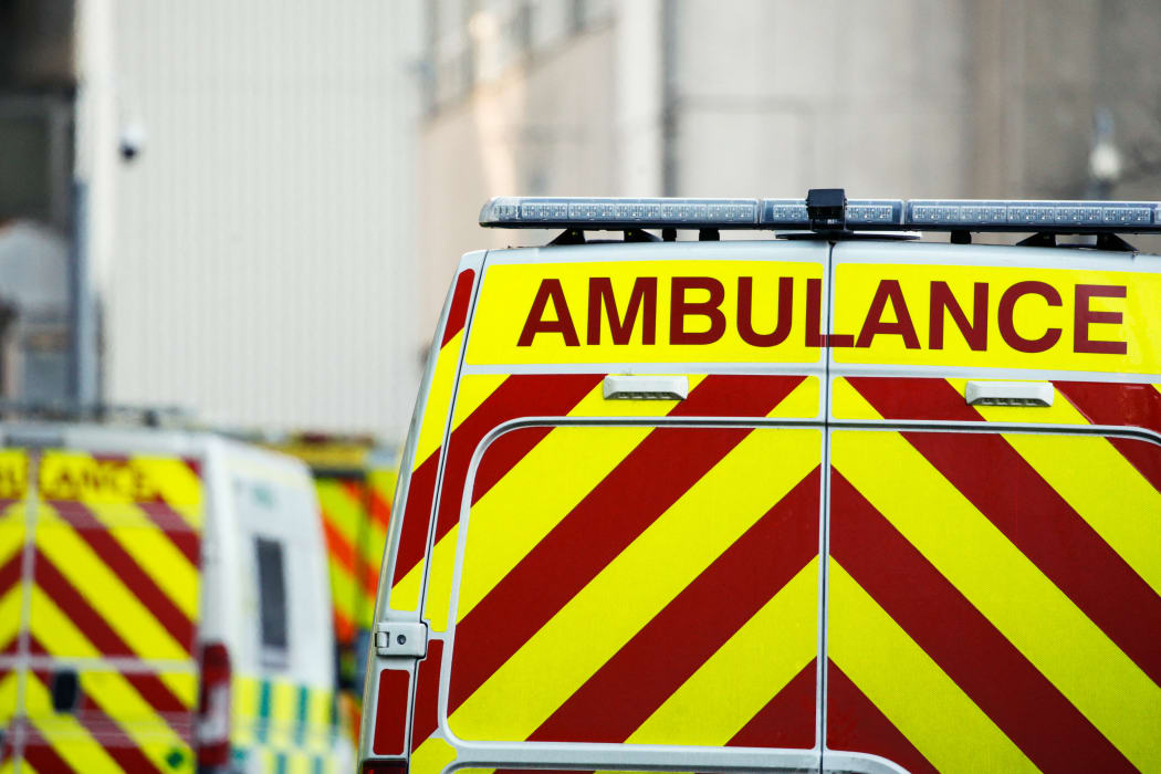 Ambulances sit outside the emergency department of the Royal London Hospital in London, England, on January 25, 2021.