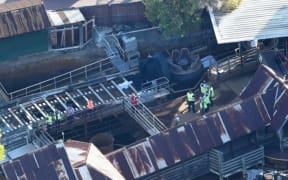Police removing the raft from the accident site at Dreamworld.