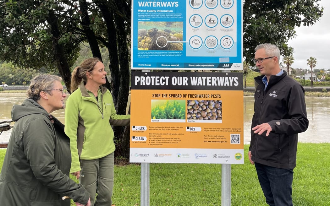 In Whanganui, Ngā Tāngata Tiaki kaihautū Nancy Tuaine (left), DOC river ranger Jane Taylor and Horizons Regional Council biodiversity and biosecurity manager Craig Davey team up to tackle the gold clam threat.