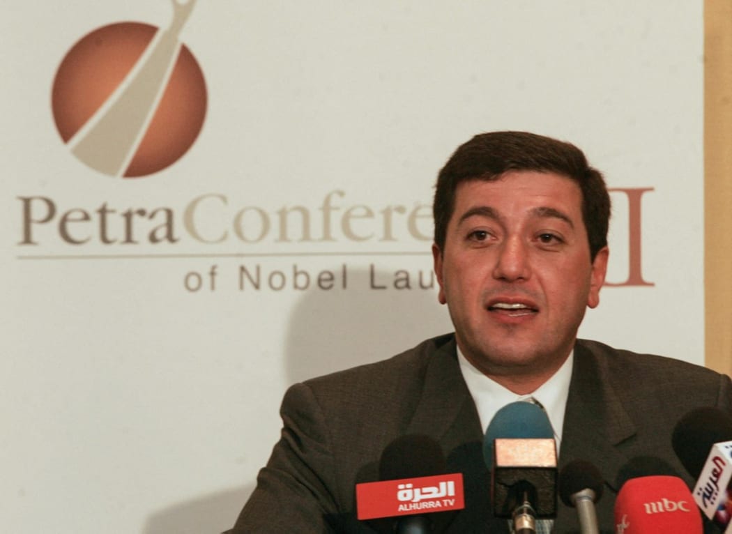 (FILES) In this file photo taken on June 20, 2006 Jordanian Bassem Awadallah, vice-president of the King Abdullah II Fund for Development (KAFD), speaks to media
