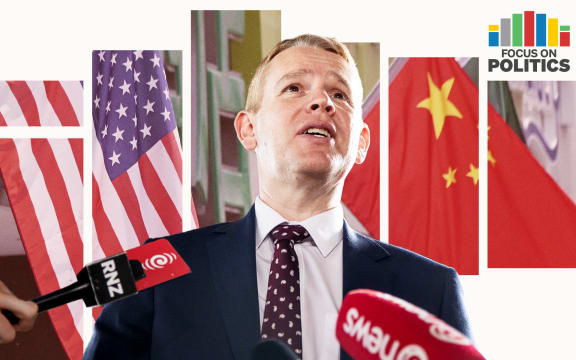 Chris Hipkins in front of US and China flags