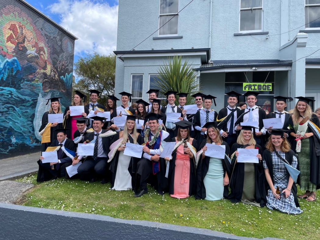 A group of students on Castle St celebrate their graduation