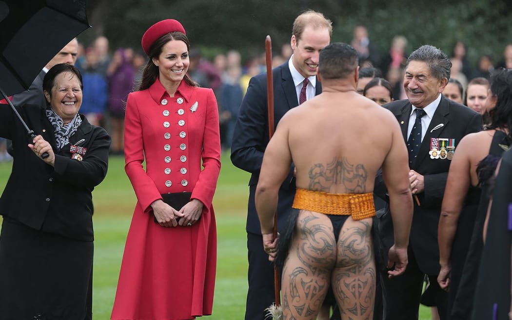 The Duke and Duchess of Cambridge with kaumatua Lewis Moeau, right, are greeted at a powhiri in the grounds of Government House.