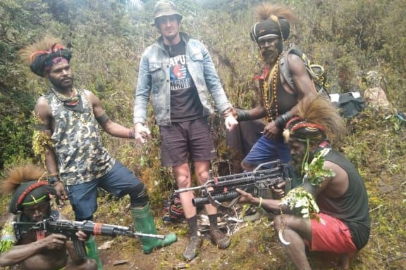 New Zealand pilot Philip Mehrtens was photographed with his rebel captors in Indonesia's Papua region.