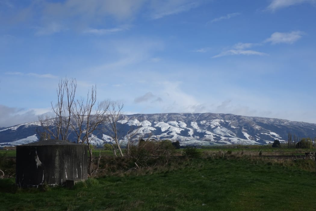 Snow-capped hills near Waihola, south of Dunedin.