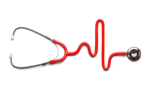 Stethoscope in the shape of a Heart Beat on a EKG.