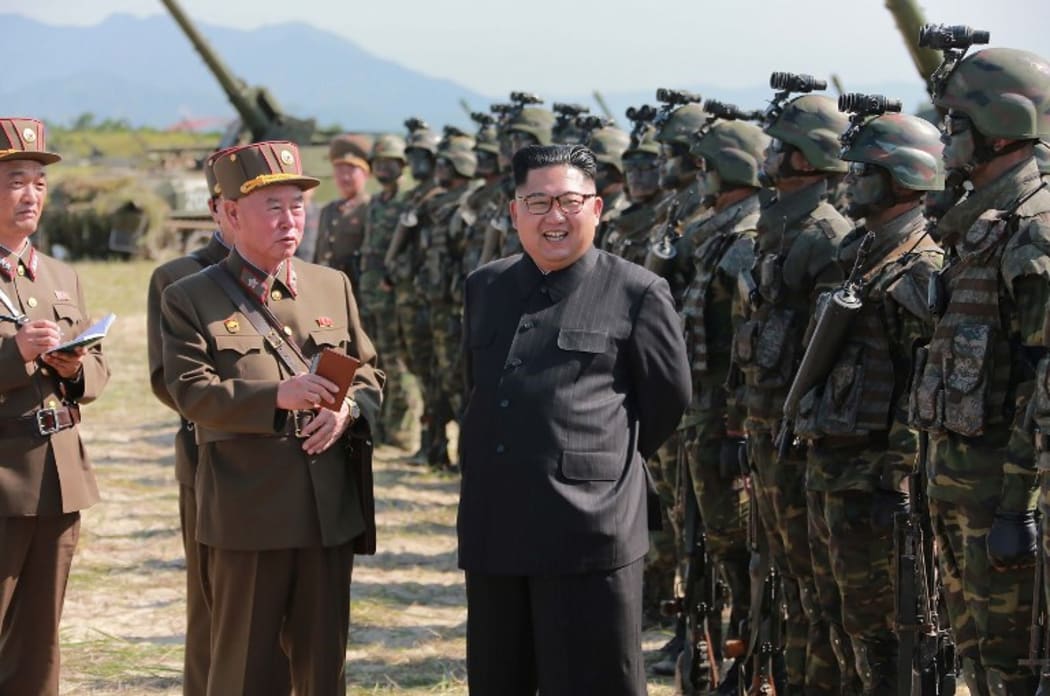 This undated photo released by North Korea's official Korean Central News Agency (KCNA) on August 26, 2017 shows North Korean leader Kim Jong-Un presiding over a target strike exercise conducted by the special operation forces of the Korean People's Army (KPA) at an undisclosed location.