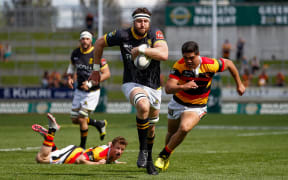 Wellington lock Jeremy Thrush makes a break to score a try during the ITM Cup rugby match - Waikato v Wellington at Waikato Stadium, Hamilton on Sunday 27 September 2015