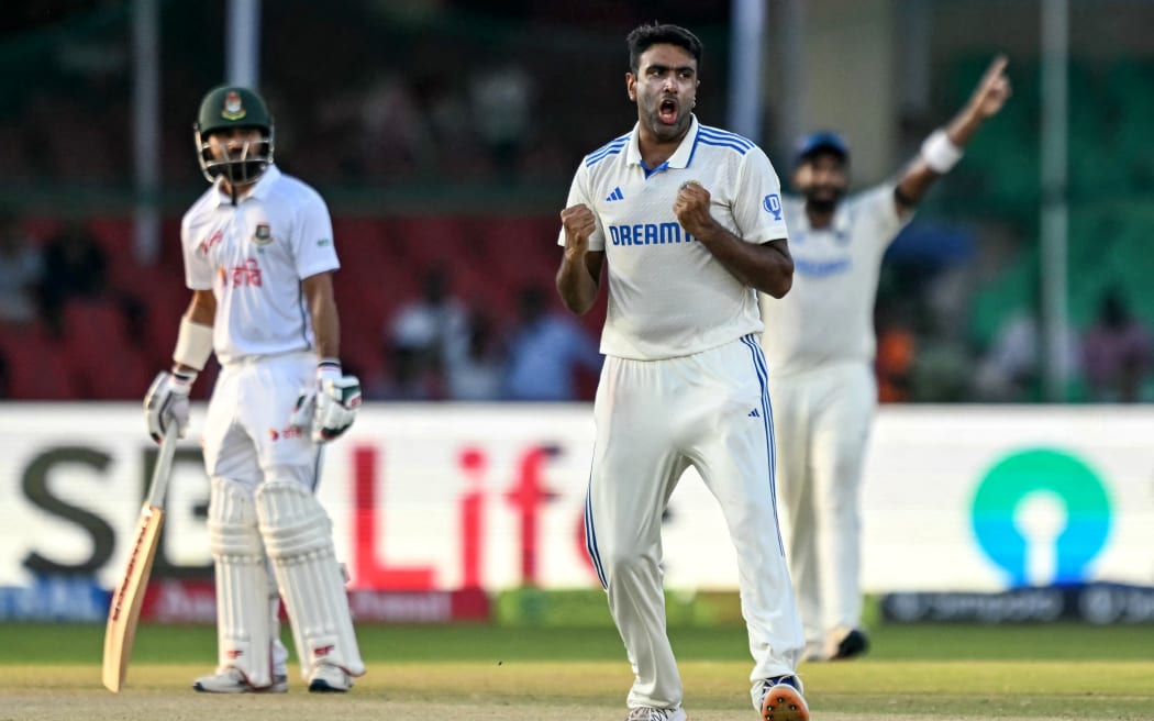 India's Ravichandran Ashwin celebrates after taking a wicket against Bangladesh, 2024.
