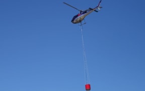 helicopter with monsoon bucket