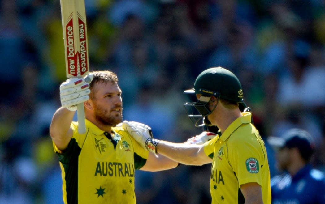 Australia's Aaron Finch celebrates a century.