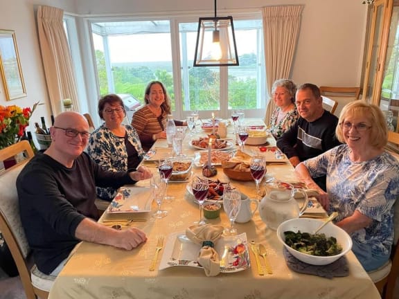Susan Templer, seated second from left, celebrated Thanksgiving early last weekend in Auckland.